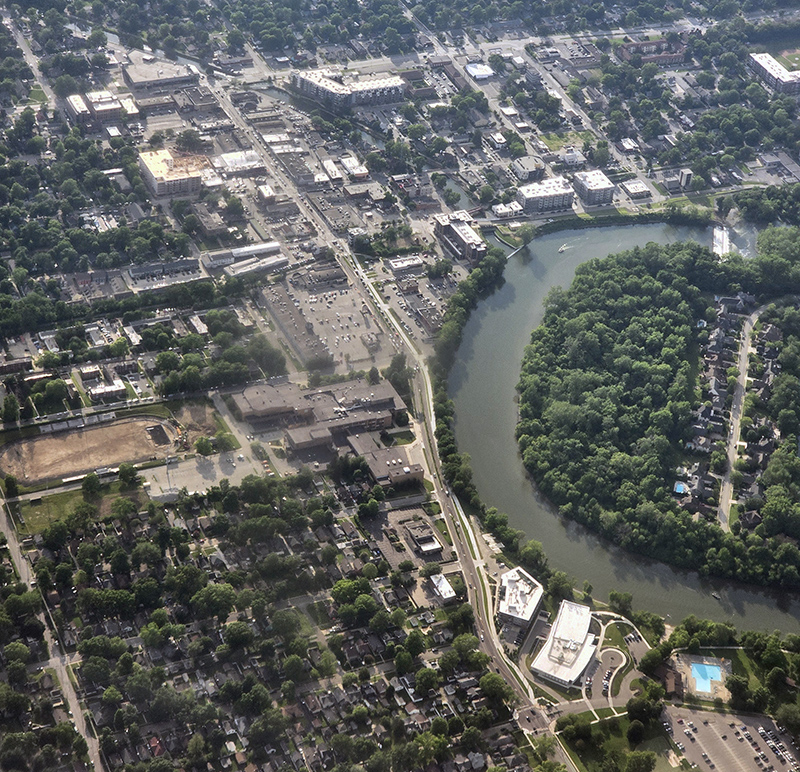 On the upper left is the construction of the Versa project at the old Kroger site. On the left in the middle is the new BRHS football field construction. The new BR Park Family Center can be seen next to the pool at the bottom. The dam that creates the canal is on the right toward the top. the canal start is by the boat on the White River.